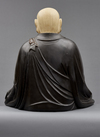 An important and very large painted wooden sculpture of a monk
