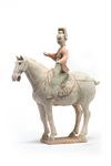 A Chinese painted pottery equestrian