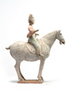 A Chinese painted pottery equestrian