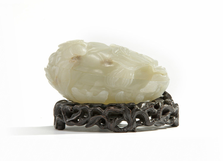 A Chinese white jade 'bitter melon' box and cover