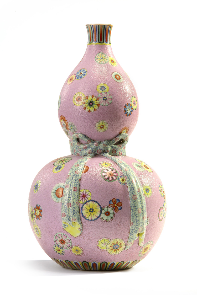 A Chinese pink-ground sgraffiato flower roundel double gourd 'trompe l'oeil' vase