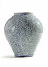 A Japanese blue and white karakusa vase