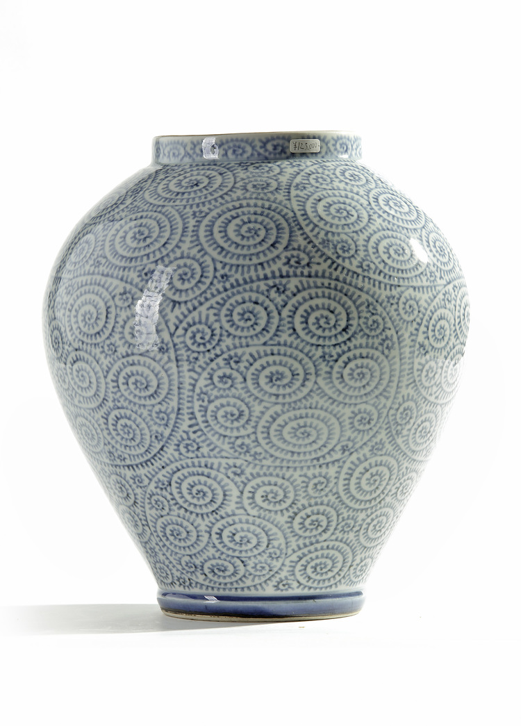 A Japanese blue and white karakusa vase