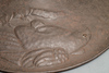 A extremely rare flat metal samurai hat (ichimonji jingasa) with a relief depicting a hawk perched in a tree watching a bird