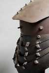An iron helmet with a plate nailed on top, resembling of the shield of a beetle (henkei kabuto)