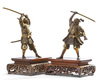 Two Japanese bronze figures of a samurai