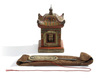 A SMALL MONGOLIAN LEATHER BAG, THREE MANUSCRIPTS SECTIONS AND A WOODEN PRAYER WHEEL, 19TH-20TH CENTURY