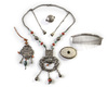 A group of Mongolian silver and metal accessories