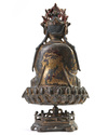 A Chinese gilt-lacquered bronze figure of Avalokitesvara