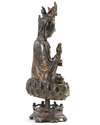 A Chinese gilt-lacquered bronze figure of Avalokitesvara