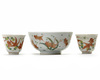 A Chinese famille verte 'goldfish' bowl and a pair of 'goldfish' cups