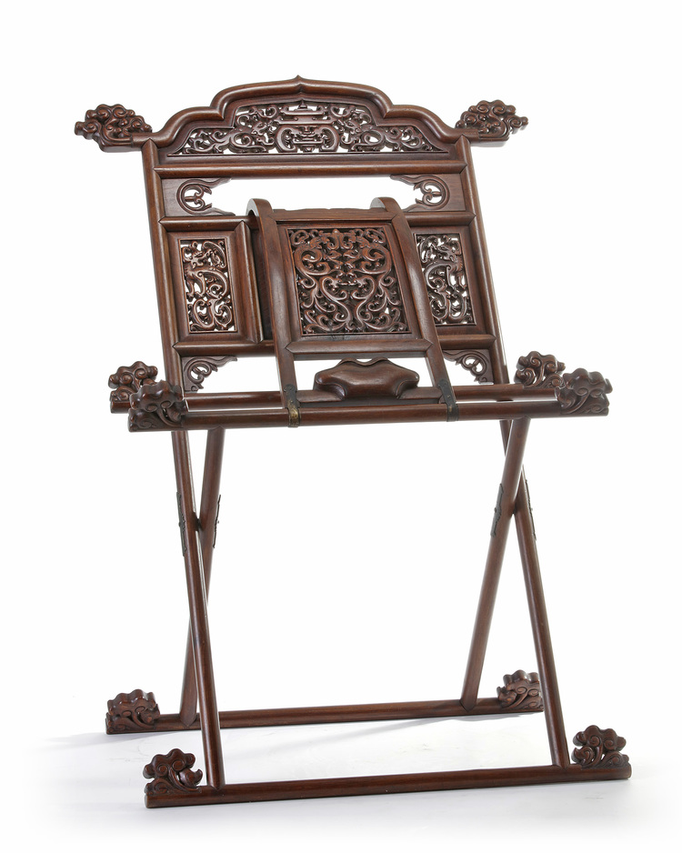 A Chinese huanghuali  carved 'qilin' stand