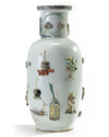 A Chinese famille rose moulded and appliqué 'precious objects' rouleau vase