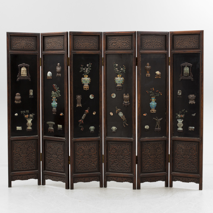 A Chinese precious objects-inlaid black lacquer carved wood six-fold screen