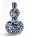 A Chinese blue and white moulded 'Kraak' 'seahorse' double-gourd vase