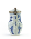 A Chinese blue and white moulded jug with European silver mounts