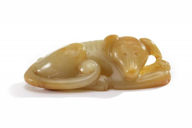 A Chinese celadon jade carving of a dog
