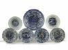 A group of seven Chinese blue and white moulded ‘Kraak porselein’ small bowls