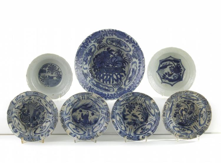 A group of seven Chinese blue and white moulded ‘Kraak porselein’ small bowls