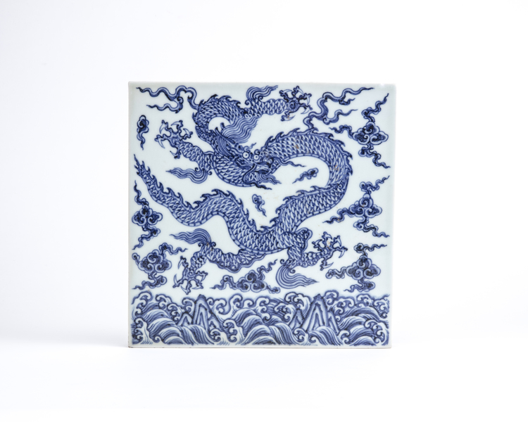 A Chinese blue and white 'dragon' tile