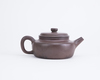 A Chinese yixing teapot and cover