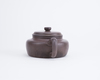 A Chinese yixing teapot and cover