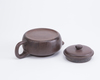 A Chinese yixing teapot and cover