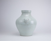A Chinese pale celadon-glazed jar