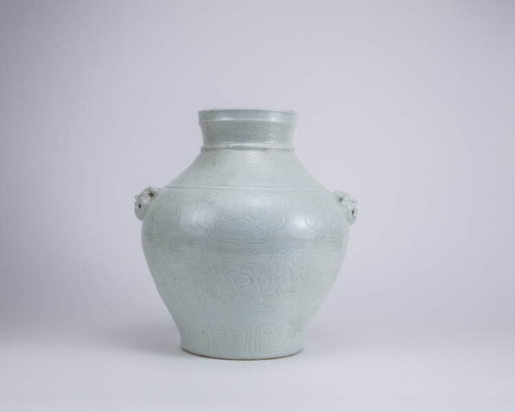 A Chinese pale celadon-glazed jar