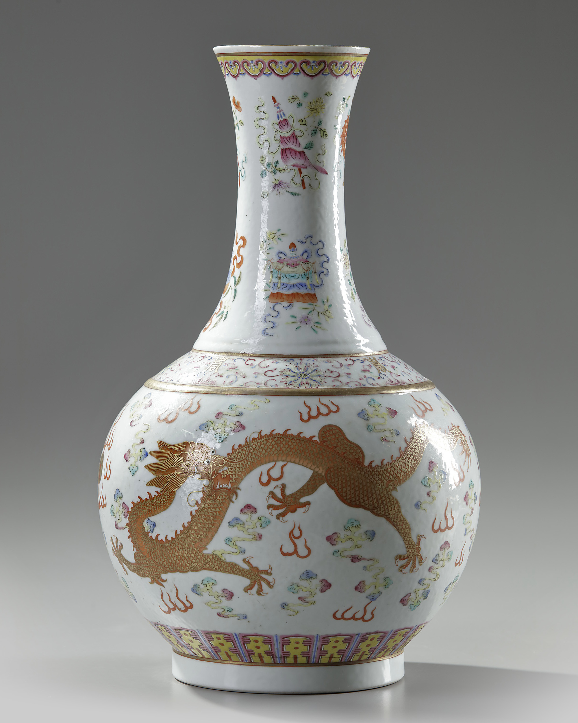 A Chinese famille rose 'dragon' bottle vase