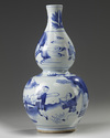 A Chinese blue and white double-gourd vase