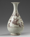 A Chinese Ming-style underglaze copper red 'phoenix' pear-shaped vase, yuhuchunping