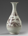 A Chinese Ming-style underglaze copper red 'phoenix' pear-shaped vase, yuhuchunping